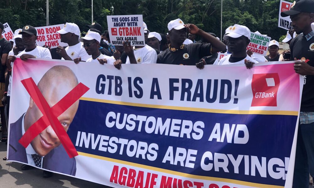Unmasking the Truth: GICN Exposes Guaranty Trust Bank’s Alleged Corruption at a protest rally