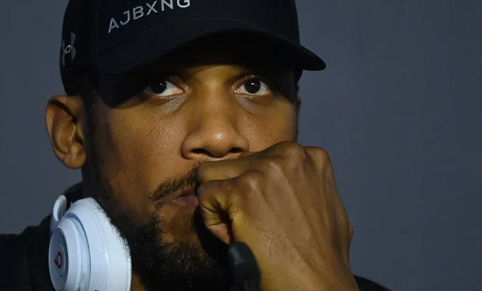 Anthony Joshua Returns to UK After Surviving Fatal Ogun Crash